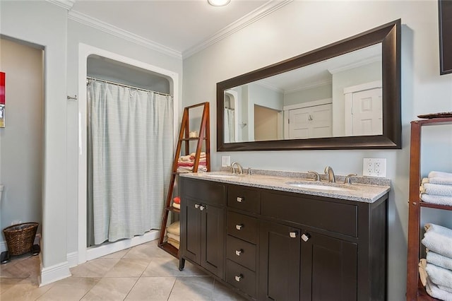 bathroom featuring curtained shower, vanity, crown molding, and tile patterned flooring