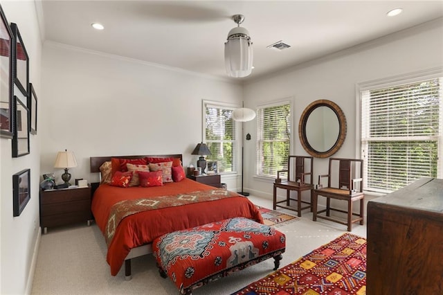 carpeted bedroom with crown molding