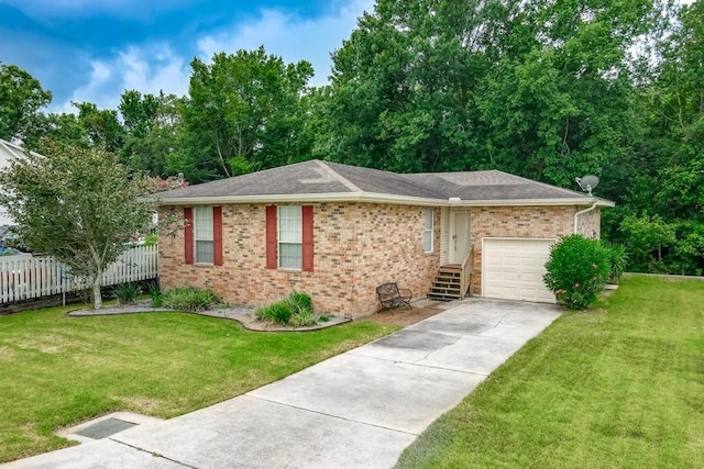 ranch-style home with a front yard and a garage