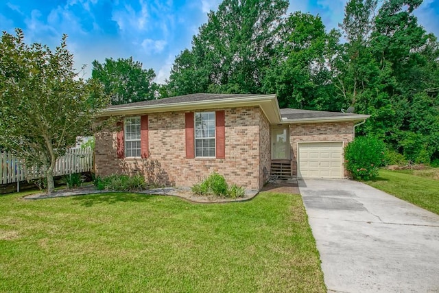 ranch-style house with a front yard and a garage