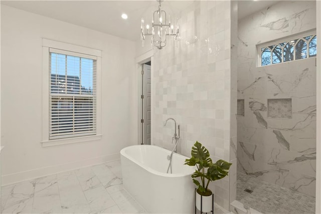 bathroom featuring independent shower and bath