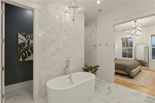 bathroom featuring a washtub