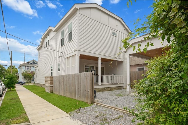 201 S Cortez St, New Orleans, LA 70119 - view of side of home with a ceiling fan