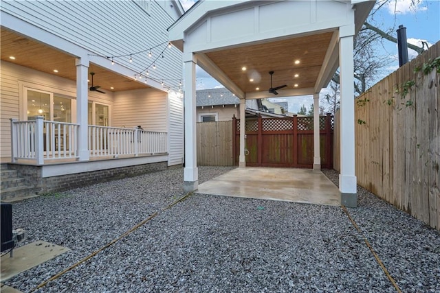 view of patio featuring ceiling fan