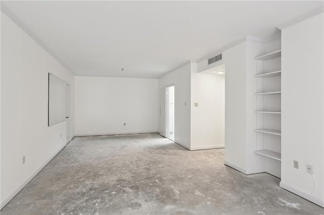 spare room with concrete flooring