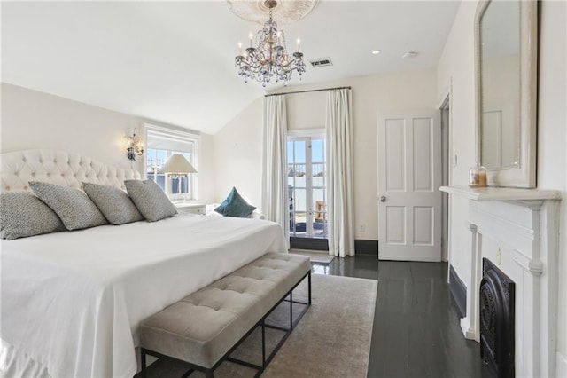 bedroom with lofted ceiling, access to exterior, an inviting chandelier, and dark wood-type flooring