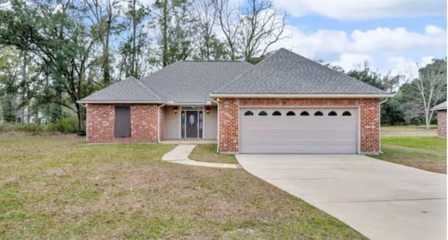 single story home with a front lawn and a garage