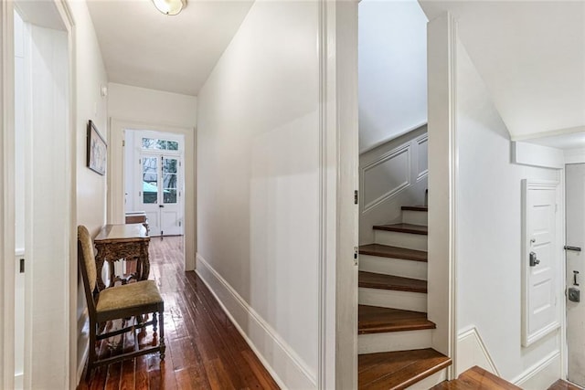 hall with dark hardwood / wood-style flooring