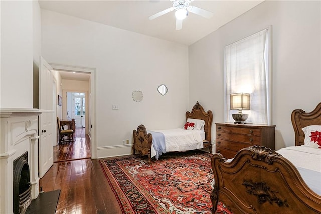 bedroom featuring dark hardwood / wood-style floors and ceiling fan