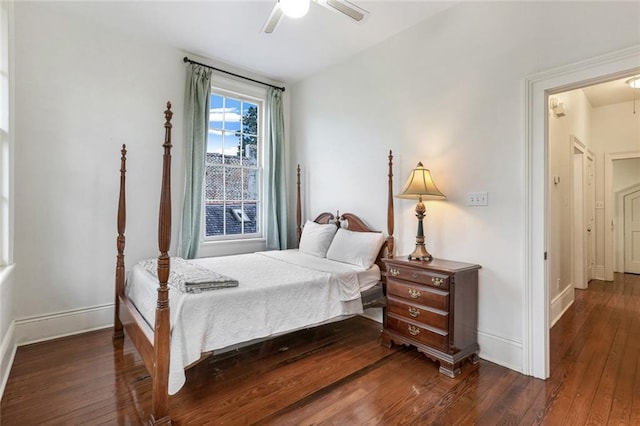 bedroom featuring dark wood-type flooring and ceiling fan