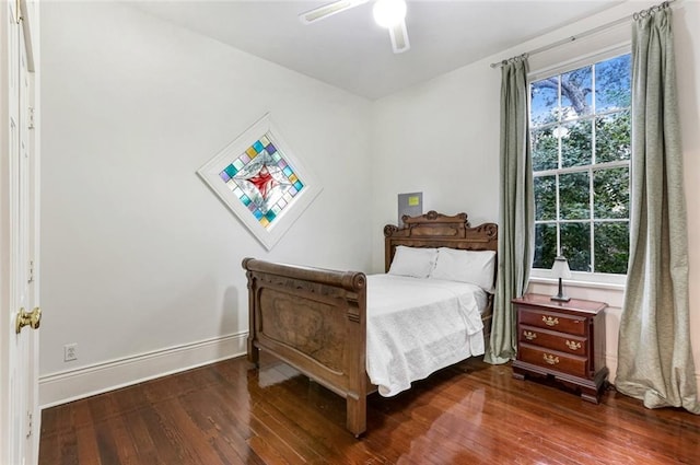 bedroom featuring wood-type flooring and ceiling fan