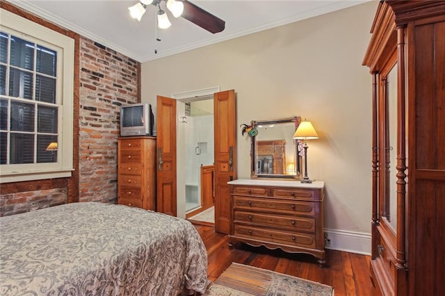 bedroom featuring ornamental molding, dark wood-type flooring, and ceiling fan