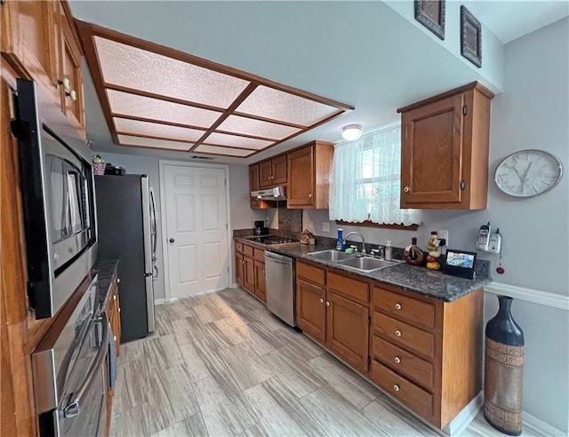 kitchen featuring appliances with stainless steel finishes and sink