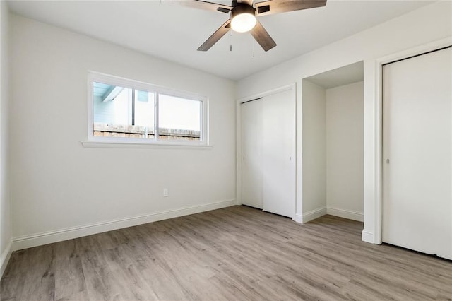 unfurnished bedroom featuring ceiling fan and light hardwood / wood-style flooring