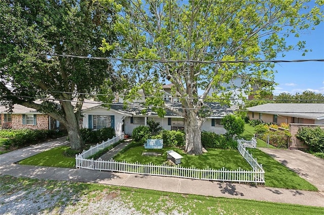 single story home featuring a front yard