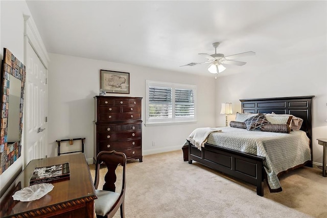 112 Bayou Perez Dr, Madisonville, LA 70447 - bedroom with carpet, baseboards, a ceiling fan, and a closet