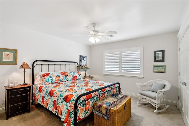 112 Bayou Perez Dr, Madisonville, LA 70447 - carpeted bedroom with baseboards, a ceiling fan, and a closet