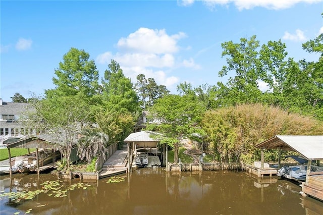 112 Bayou Perez Dr, Madisonville, LA 70447 - dock with boat lift, a water view, and a gazebo
