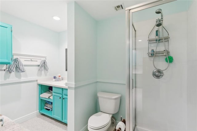 112 Bayou Perez Dr, Madisonville, LA 70447 - bathroom featuring a stall shower, toilet, vanity, recessed lighting, and baseboards