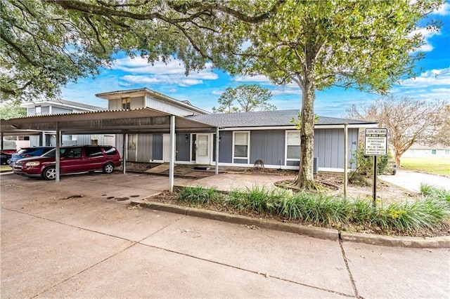 view of front facade with a carport