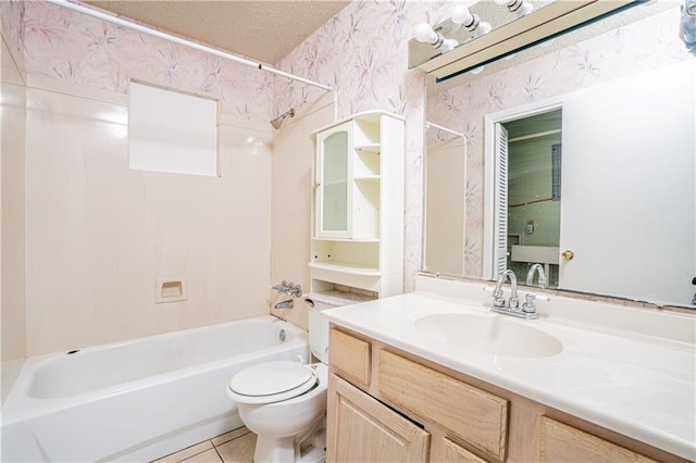 full bathroom with toilet, a textured ceiling,  shower combination, tile patterned floors, and vanity