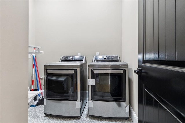 laundry area with washer and clothes dryer