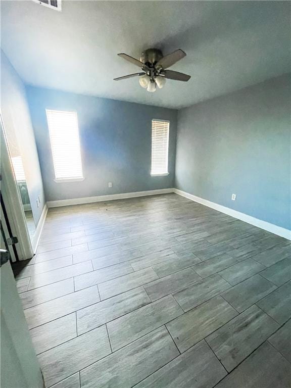 empty room featuring ceiling fan