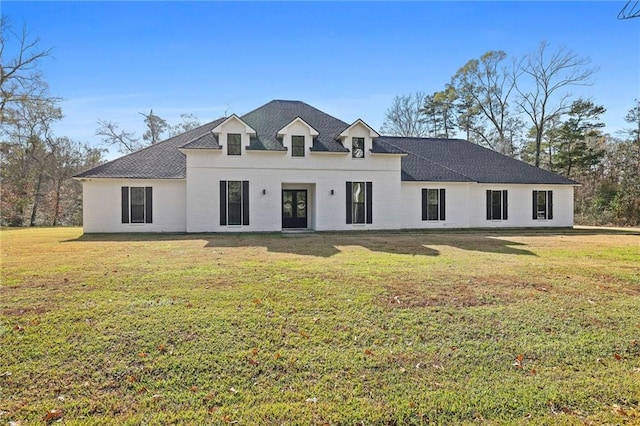 view of front of property with a front lawn