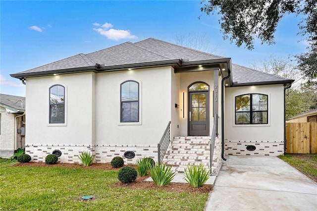 view of front of home with a front lawn