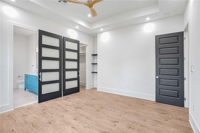 entrance foyer featuring ceiling fan and light hardwood / wood-style flooring