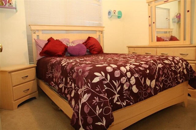 bedroom featuring carpet flooring