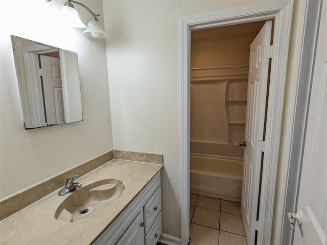 full bathroom with vanity and tile patterned floors