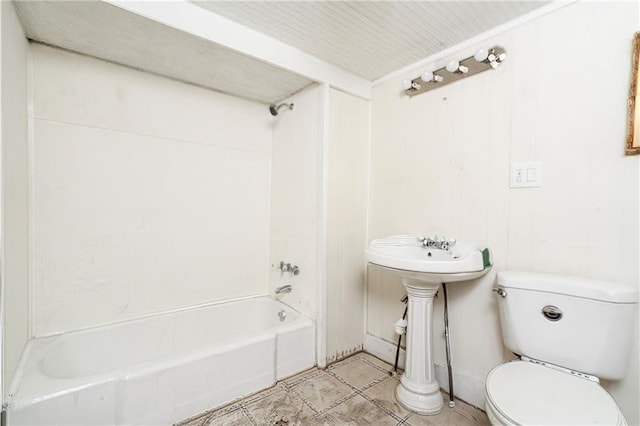 bathroom with shower / bathtub combination and toilet