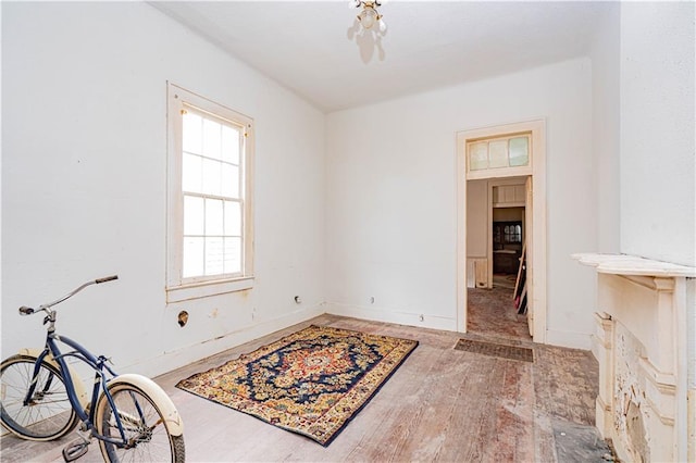 spare room with hardwood / wood-style floors