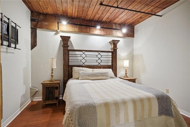 bedroom with wood ceiling and hardwood / wood-style flooring