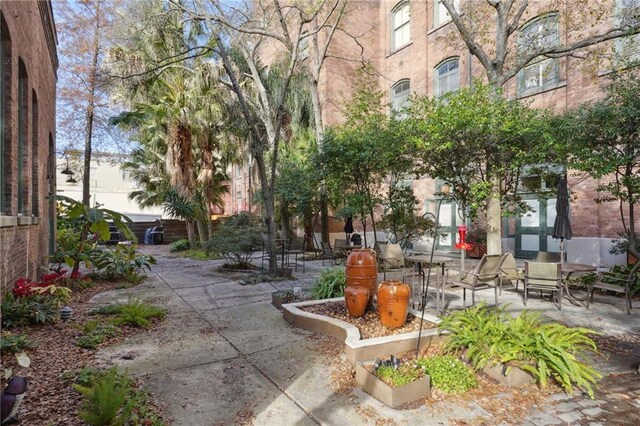 view of community with a patio area