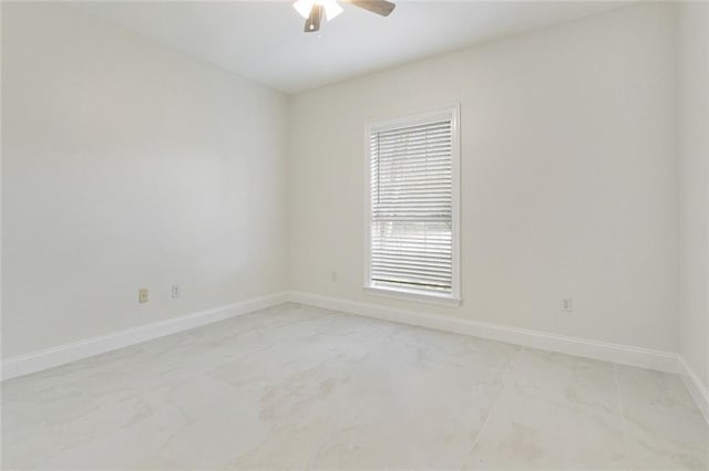 empty room featuring ceiling fan