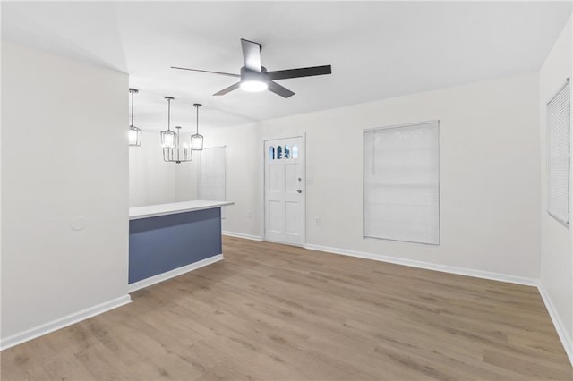 spare room featuring hardwood / wood-style flooring and ceiling fan