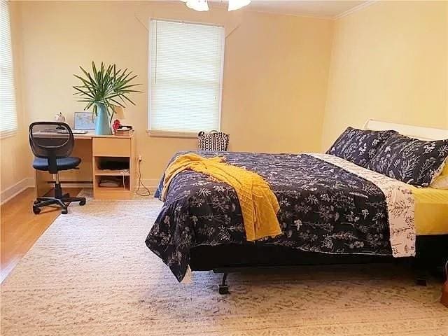 bedroom featuring ornamental molding