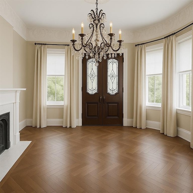 7917 Sycamore St, New Orleans, LA 70118 - entryway with a chandelier, french doors, baseboards, and a fireplace with flush hearth