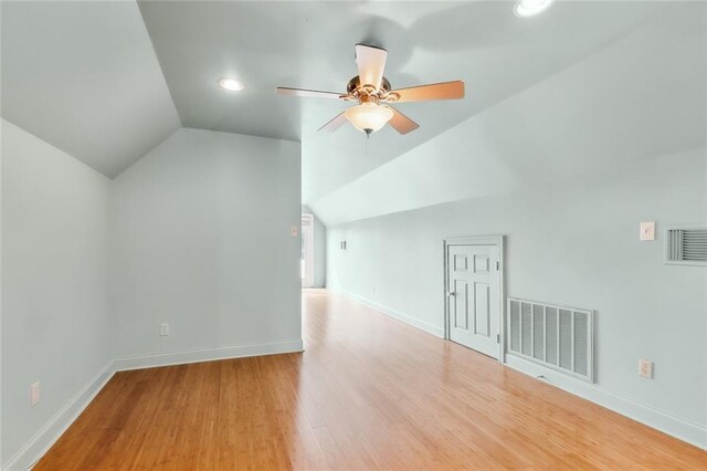 bonus room with ceiling fan, light wood-type flooring, and lofted ceiling