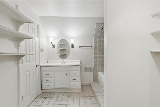 bathroom with tub / shower combination and vanity