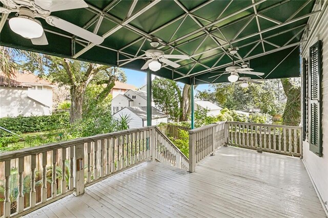 wooden terrace with ceiling fan