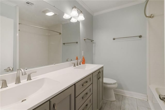 full bathroom with shower / tub combination, tile patterned flooring, vanity, toilet, and crown molding