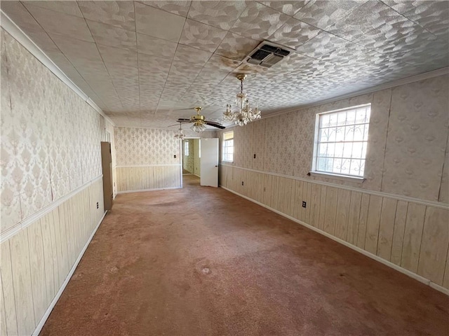 unfurnished room with ceiling fan and carpet flooring