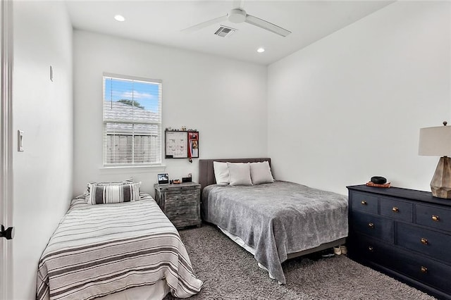 carpeted bedroom featuring recessed lighting, visible vents, and a ceiling fan