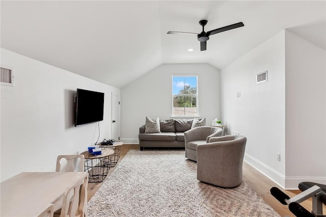 1012 Athania Pkwy, Metairie, LA 70001 - living room featuring wood finished floors, a ceiling fan, baseboards, and vaulted ceiling