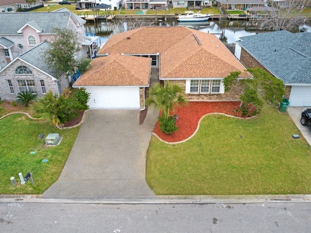 aerial view featuring a water view