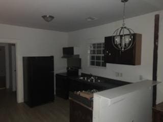 kitchen with wood-type flooring