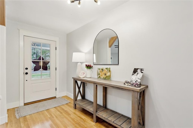 doorway to outside with hardwood / wood-style floors